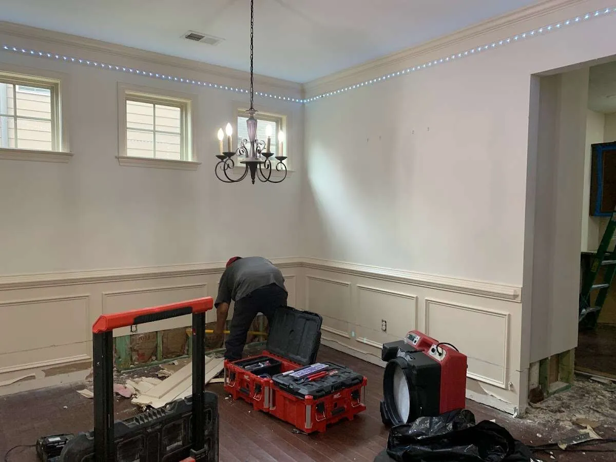 Restoration technician with professional equipment in Cinnaminson